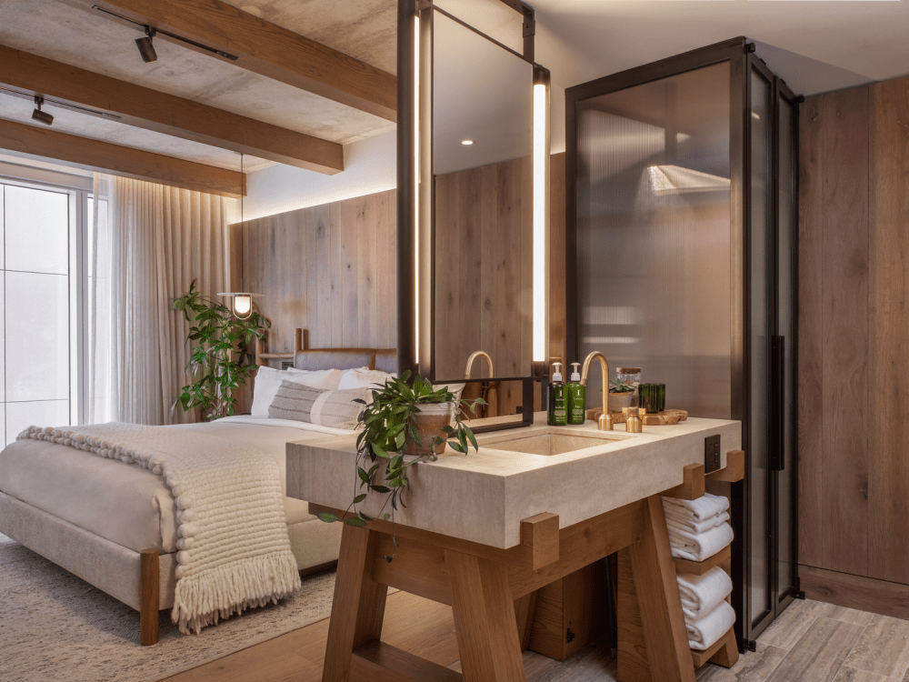 Camera da letto con bagno con lavandino