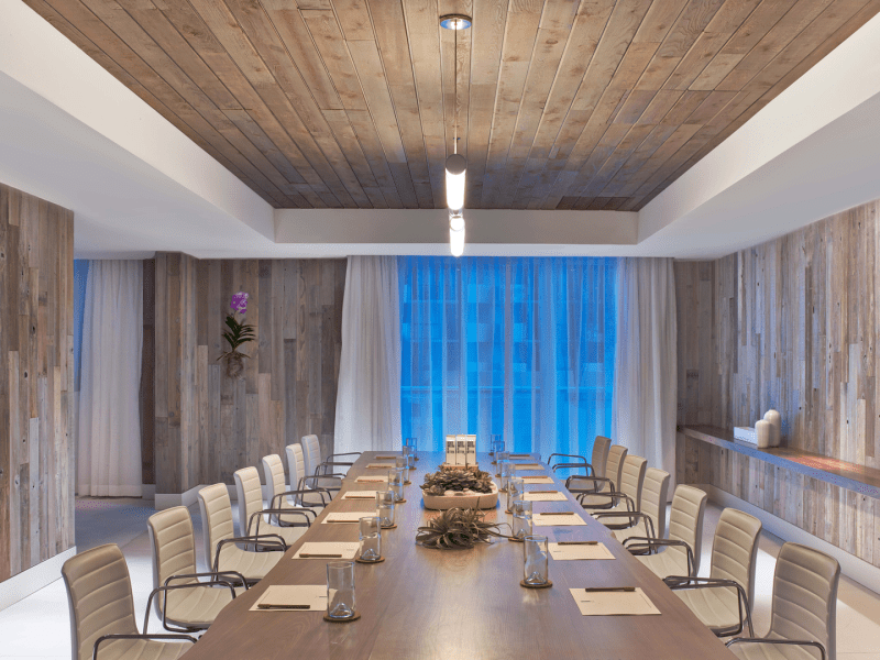 Long table with chairs in a meeting room