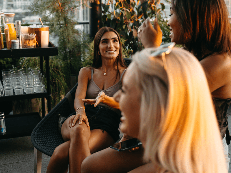 group of friends hanging out on a rooftop in nashville