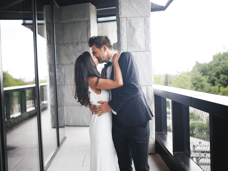 Bride and groom kissing 