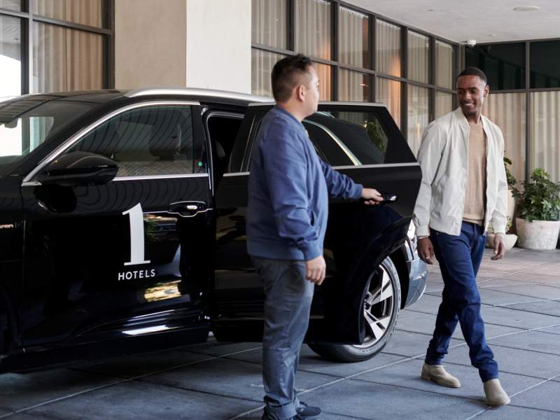 A valet welcomes guest 