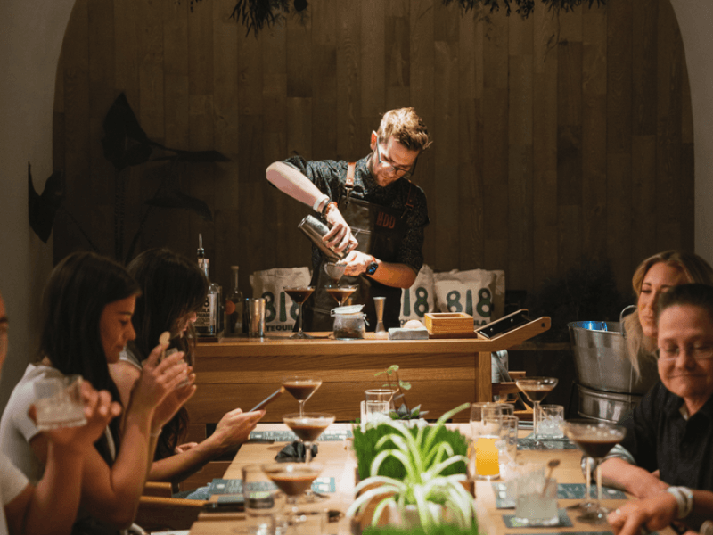 a man serving drinks