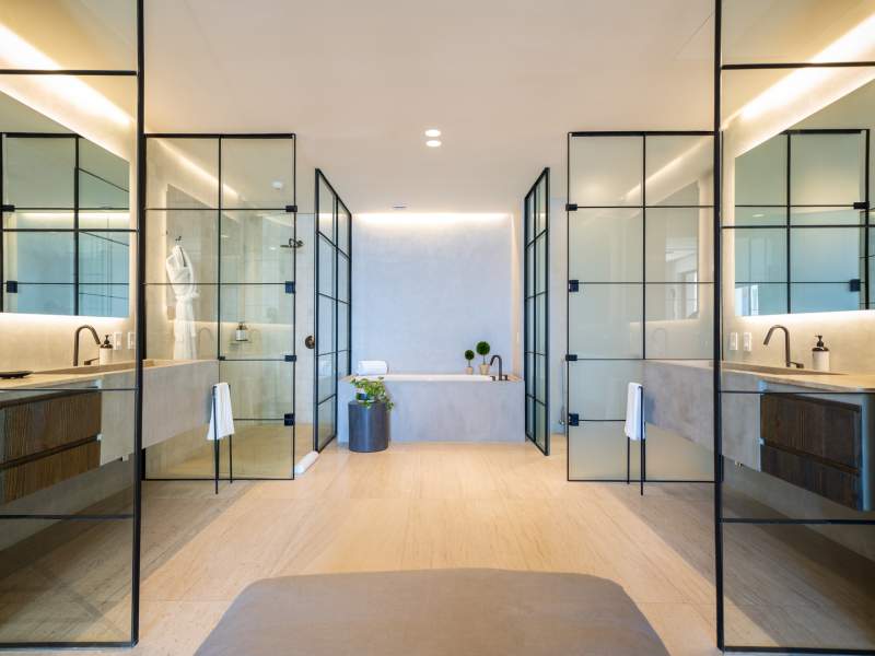 Double sided bathroom with stand up showers