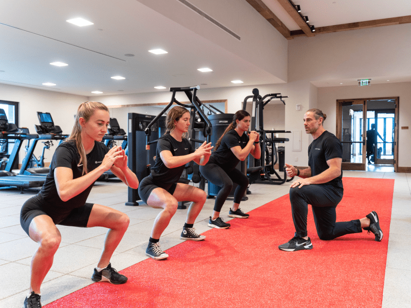 people doing squats