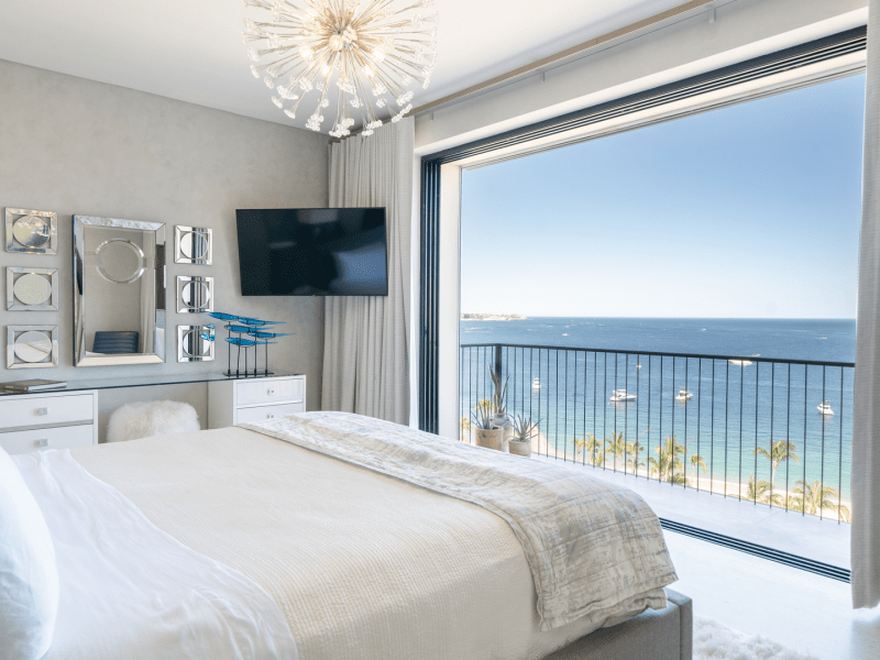 bedroom with floor-to-ceiling window