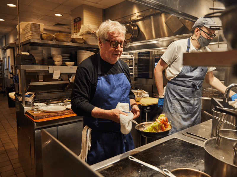 Chef Jonathan Waxman preparing food 