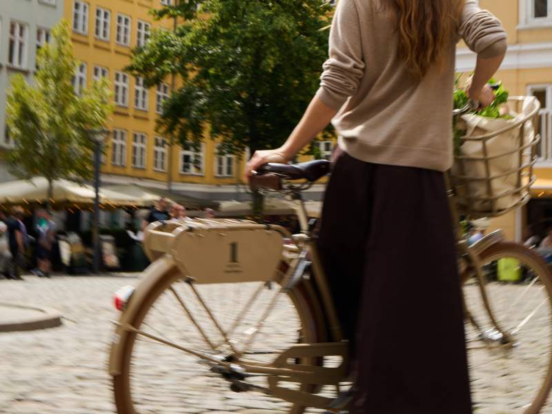 Woman with bike in Copenhagen