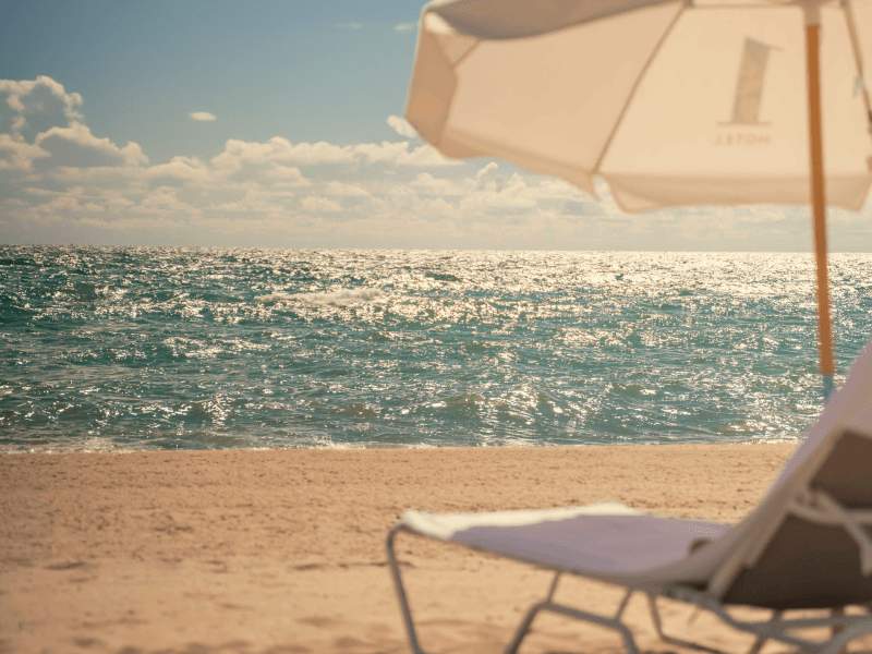 Beach chairs and umbrella