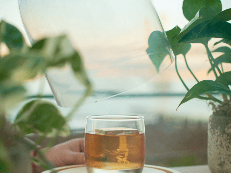 Smoked Old Fashioned cocktail on rooftop