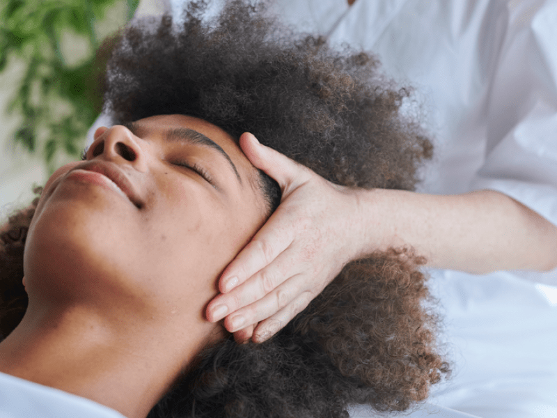 Person receiving a head massage