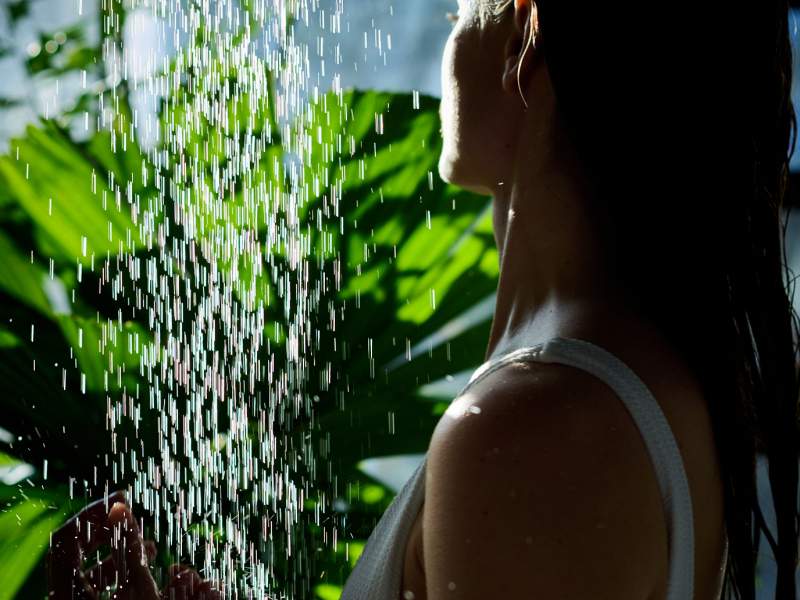 Woman in Pool Shower