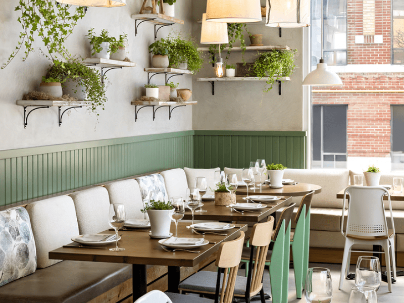 A dining area with green accents