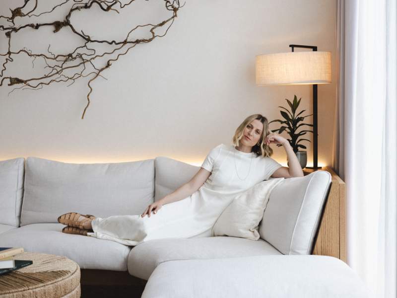 Catie Sitting on a Couch