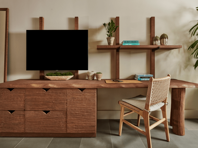 Brown desk with drawers and shelves