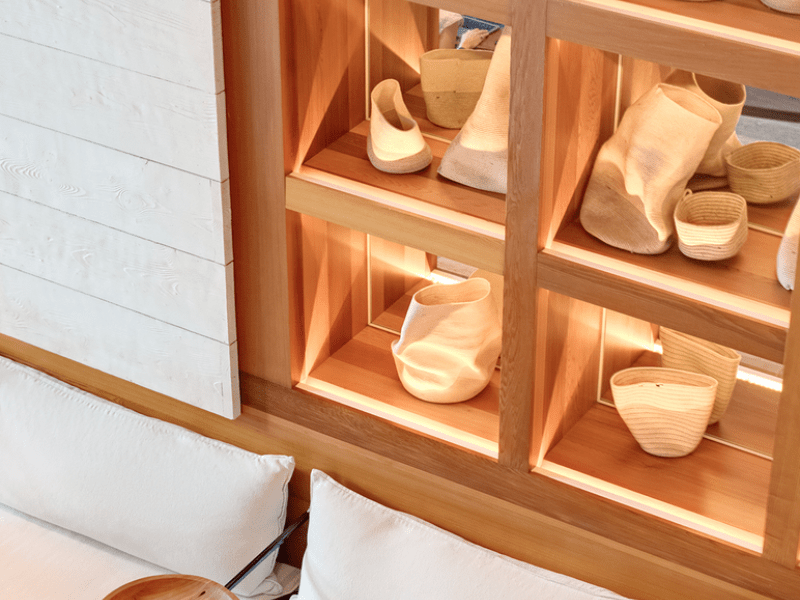 Woven bags in wall cubbies