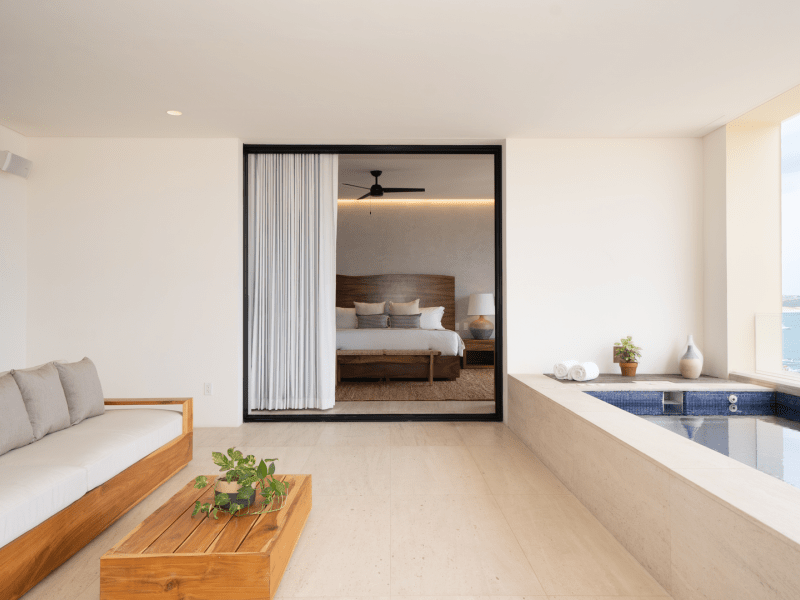 Large mirror next to a personal indoor pool