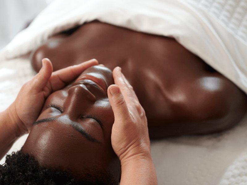 Woman receiving a facial at Bamford Wellness Spa