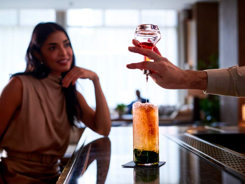 Cocktail being served at the bar