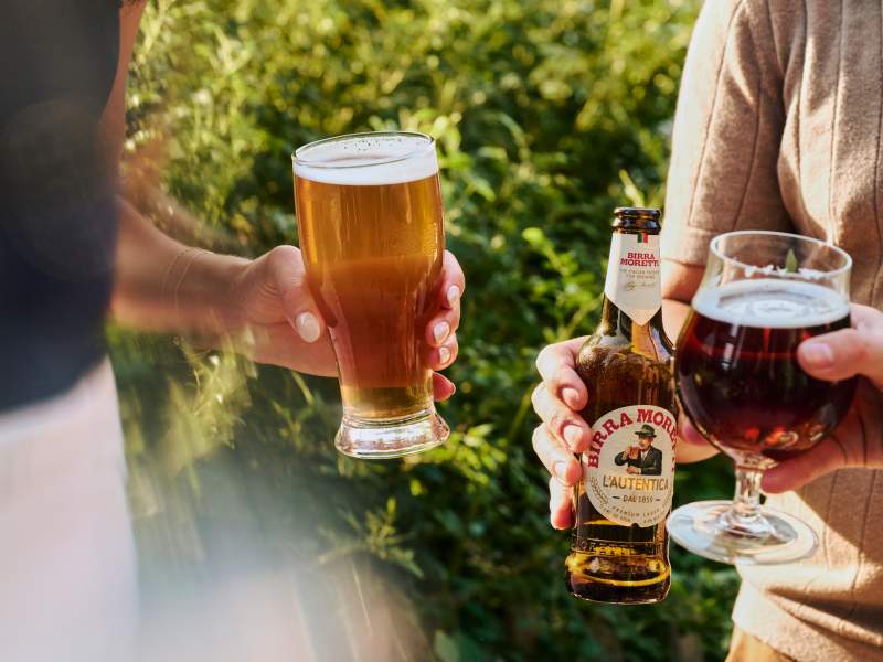 people standing outside with beer