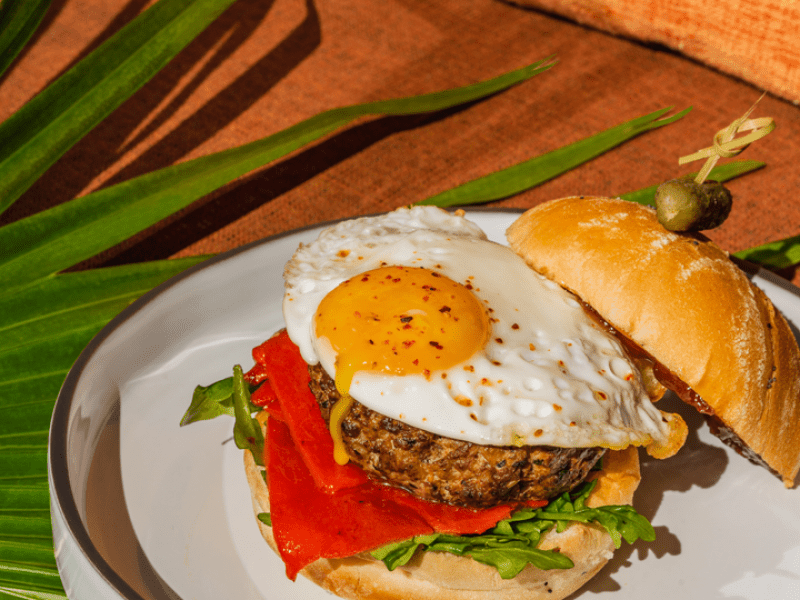 a burger with an egg on it
