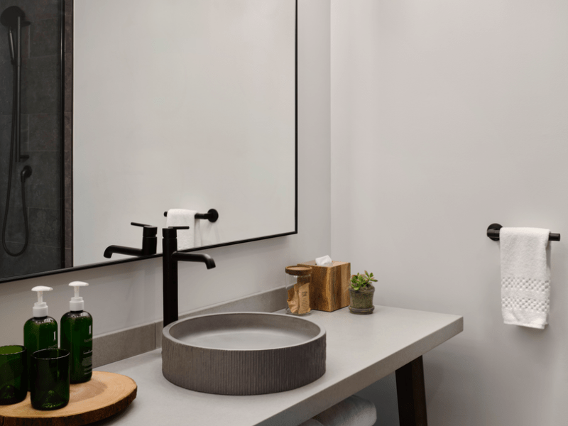 Grey bathroom with a bowl sink