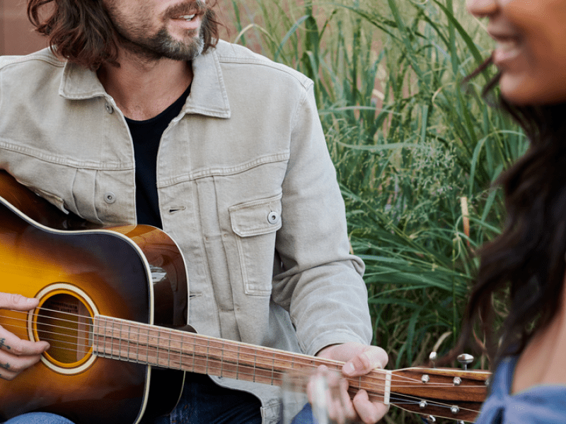 Person playing the guitar