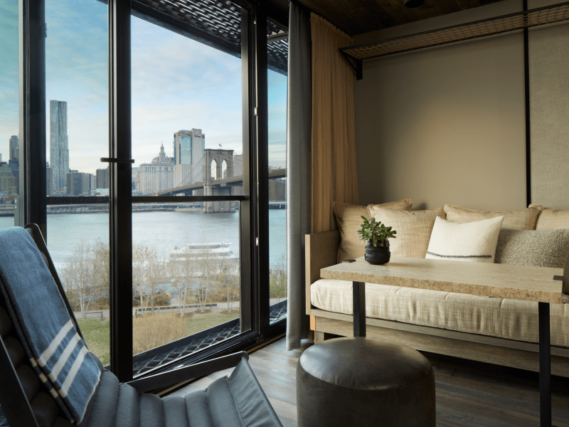 Couch overlooking the hudson river in hotel room