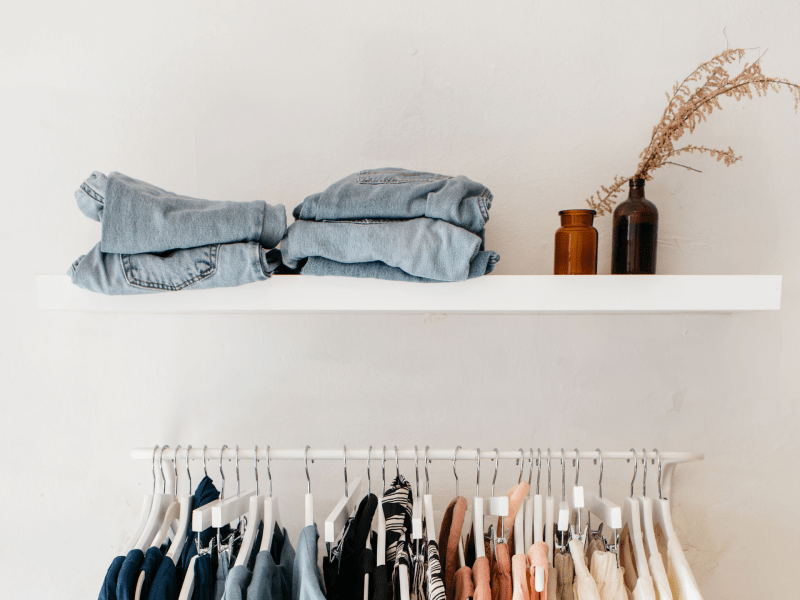 Clothes hanging in a closet