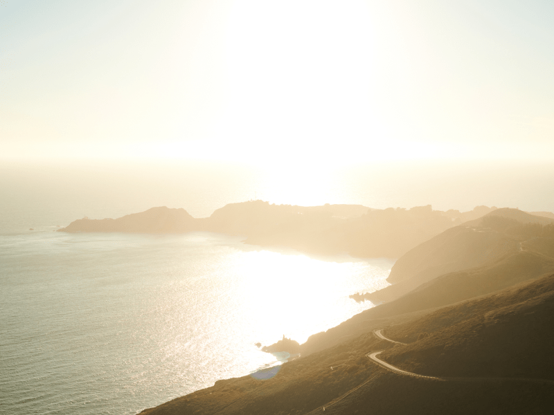 Landscape panoramic of the beach in the sunset with hills