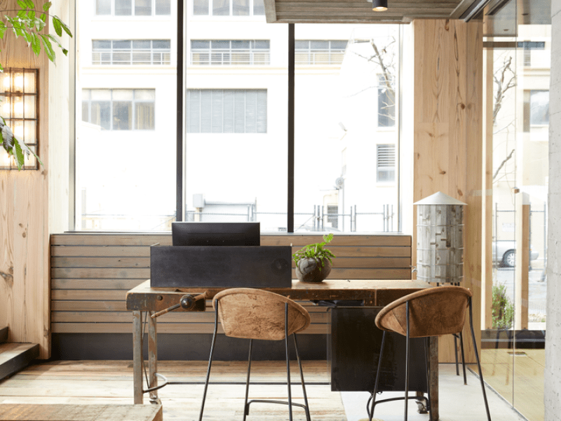 Wooden themed room with desks and chairs