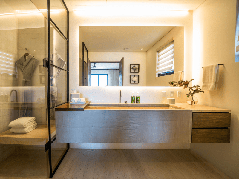 A sink next to a shower in the bathroom