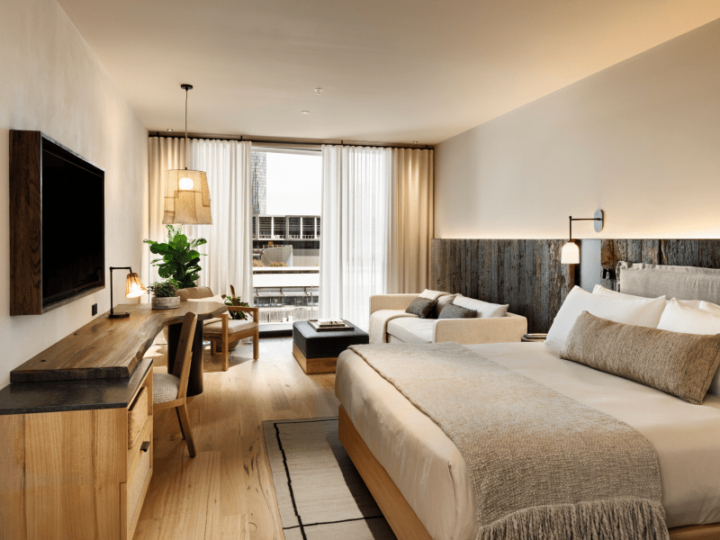 Bedroom with seating area and desk
