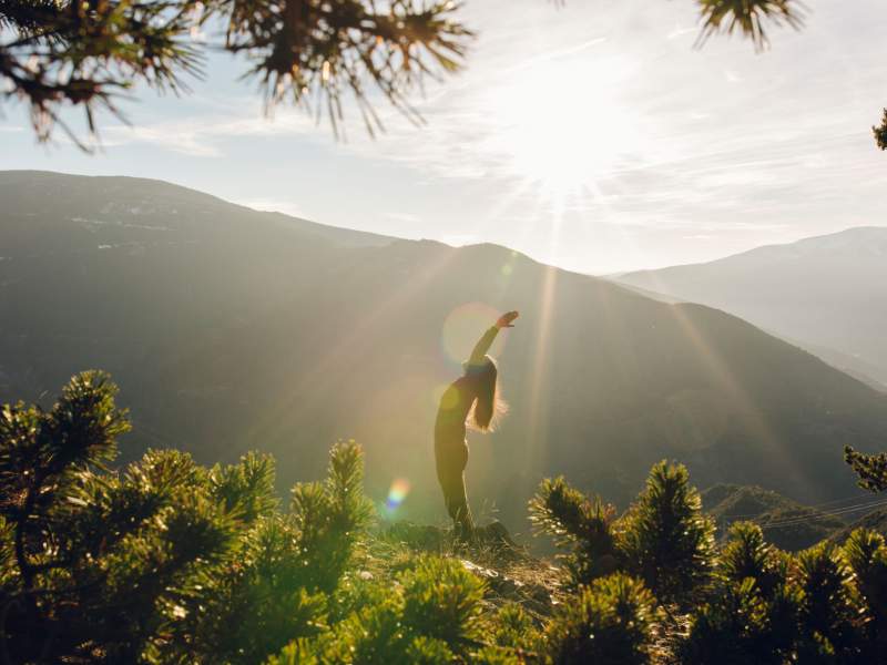 Person doing yoga outside