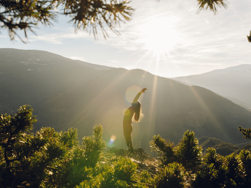 Person doing yoga outside