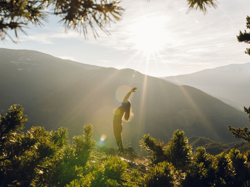 Person doing yoga outside