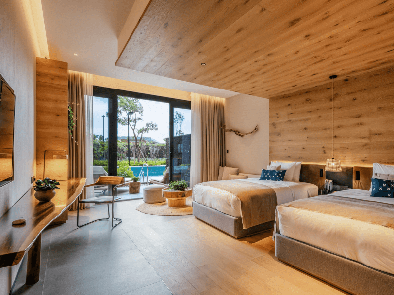 Two beds in a hotel room at 1 Hotel Haitang Bay