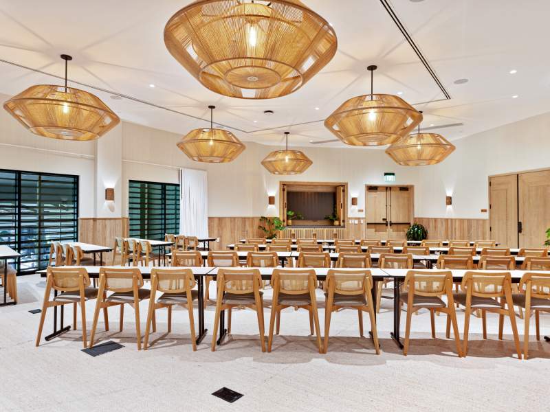 ohia meeting room with table set for 18 people