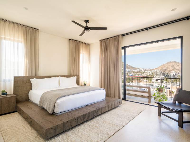 Bed raised on a wooden frame 