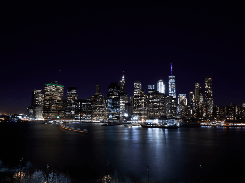 Skyline view of lit up building at night