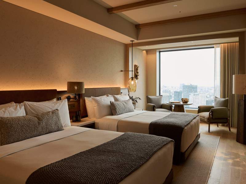 Gastenkamer met twee tweepersoonsbedden 