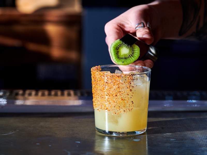 garnishing a cocktail