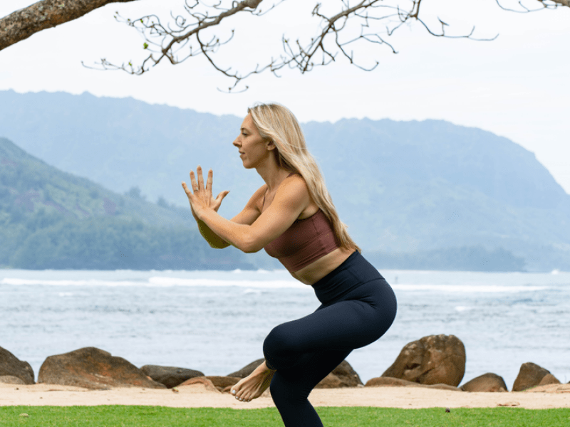 Person holding a yoga pose 