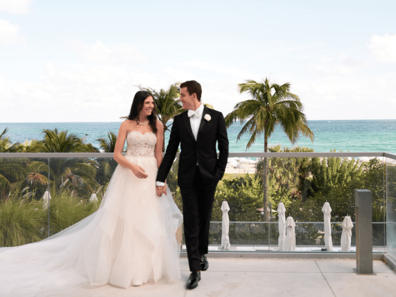 Bridge and Groom holding hands