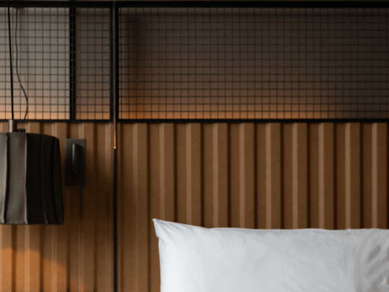 Bed in hotel guest room