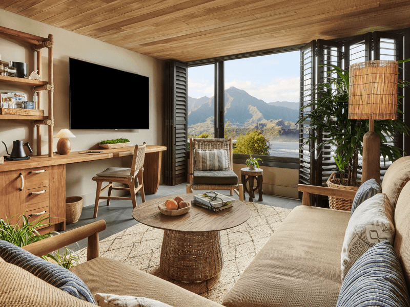 Views inside the ocean studio suite overlooking the mountains in the distance outside