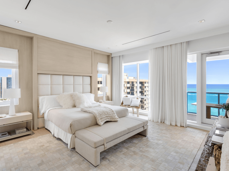 master bedroom showing king bed with ocean view