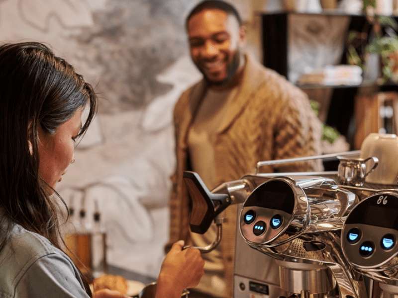 Person making a cup of coffee