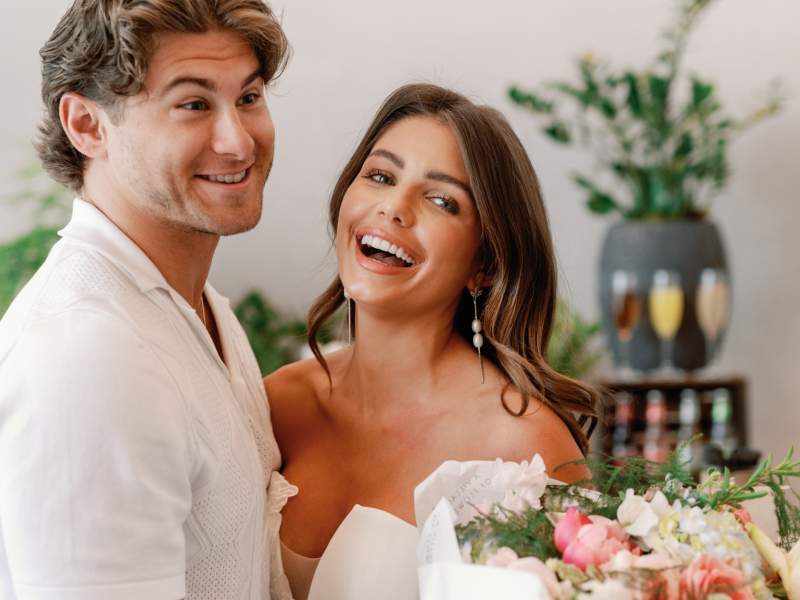 couple holding flowers