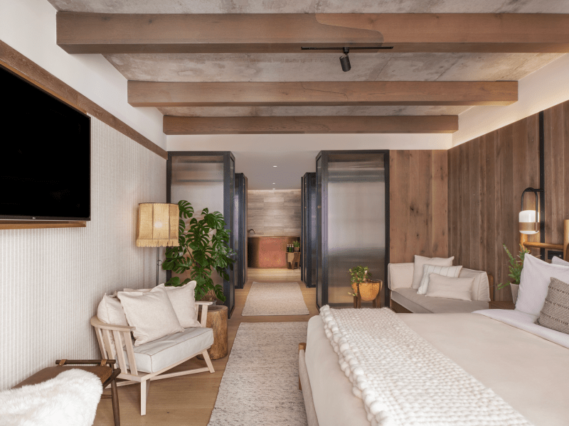 Bedroom with wood slats on the ceiling