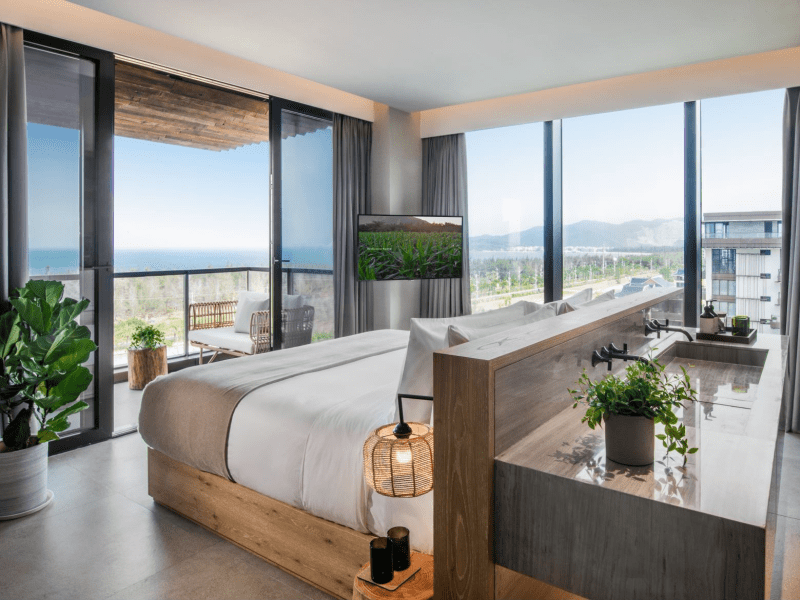 A bed with double sinks on the back